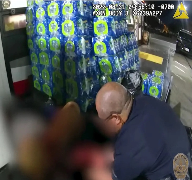 POLICE OFFICERS HELP WOMAN DELIVER BABY AT GAS STATION