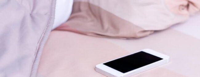 HERE’S WHY SLEEPING WITH YOUR PHONE IN BED CAN AFFECT YOUR HEALTH