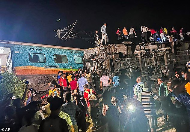 INDIA TRAIN CRASH DEATH TOLL RISES ABOVE 230 WITH 900 INJURED IN WORLD’S DEADLIEST TRAIN DISASTER IN 20 YEARS