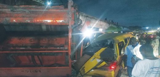 Refuse truck falls off bridge and kills tricycle rider in Lagos